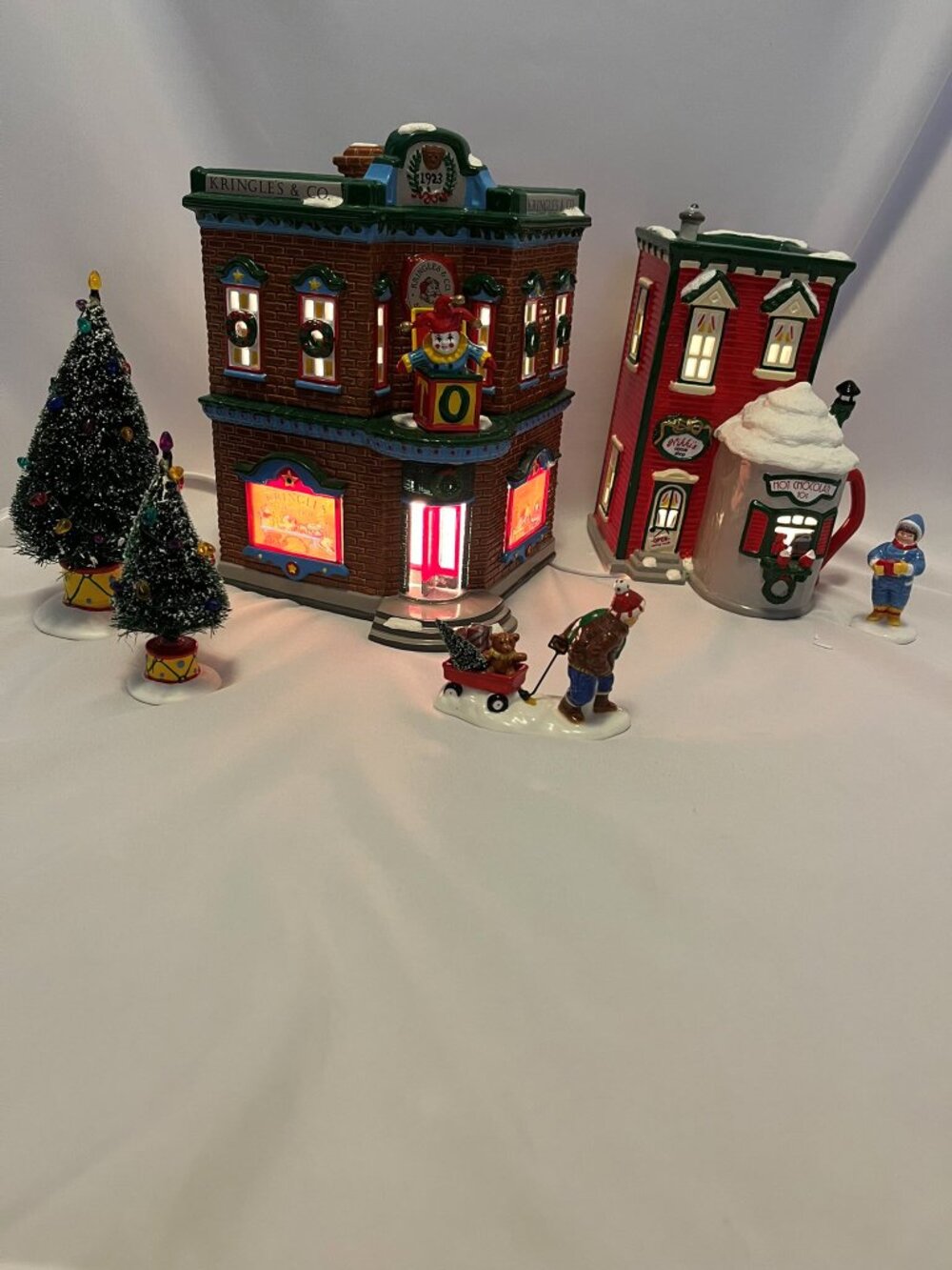 Department 56 Snow Village – “Saturday Morning Downtown”
